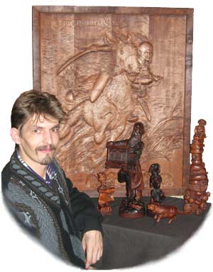 The master of woodcarving Victor Kaut. A wooden sculpture. Business vip souvenirs. Original elite gifts. Exclusive souvenirs. The Ukrainian subjects.